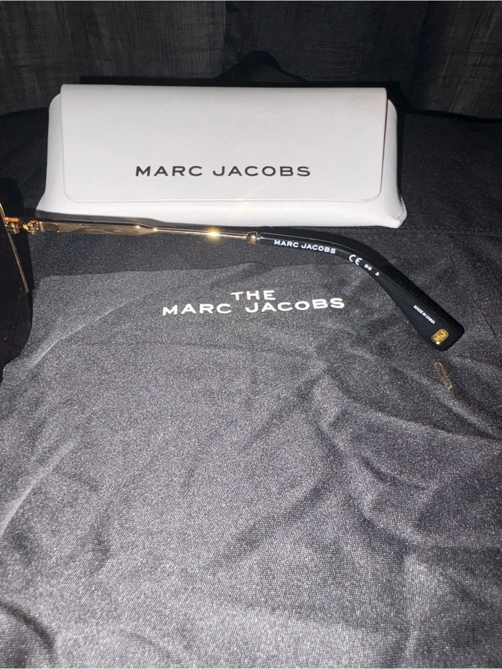 Marc Jacobs Gold Frame Sunglasses with Dark Lenses